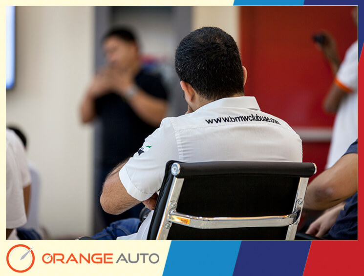 A BMW Club man at presentation at Orange Auto center