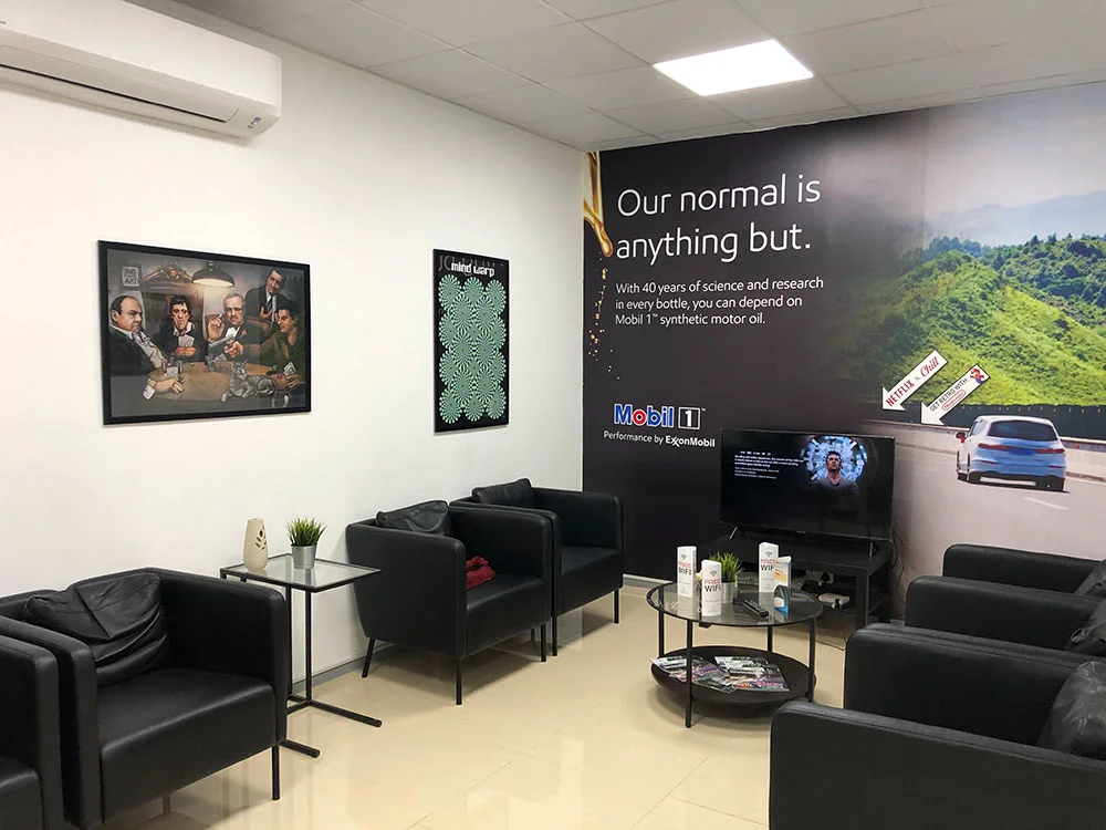 Orange Auto car garage lounge Dubai