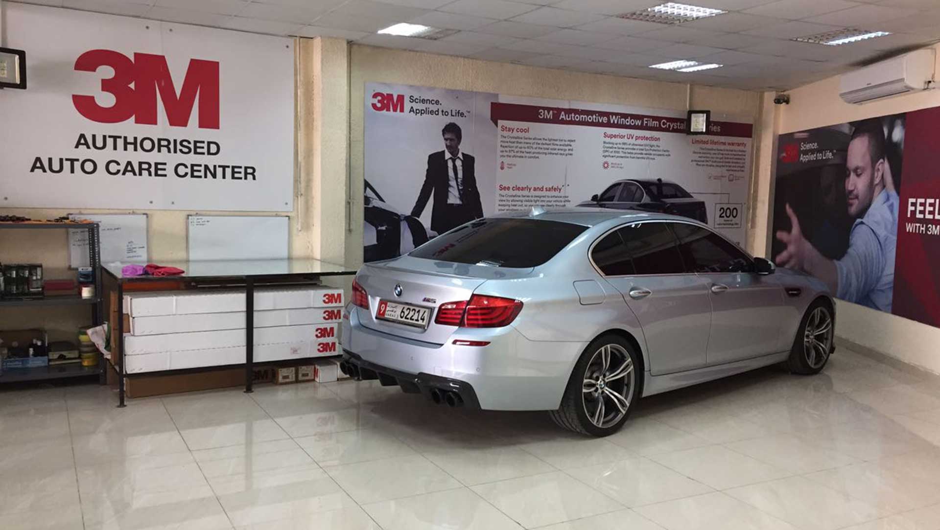 Silver BMW at Orange Auto car garage services Dubai