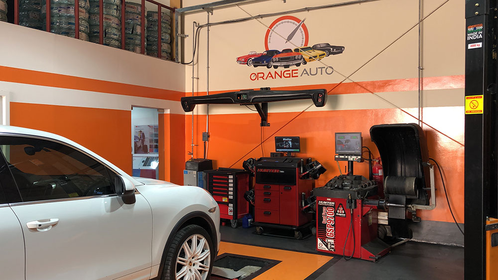 Orange Auto car garage with instruments Dubai