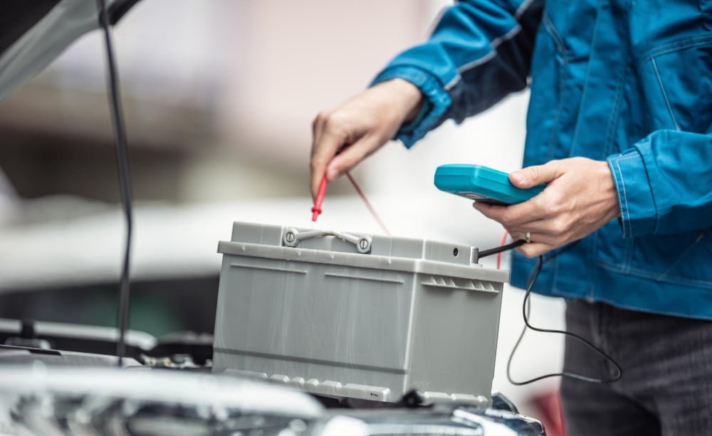 Inspecting BMW car battery